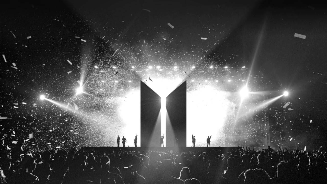 Концерт на BTS със силует на логото на BTS Тапет