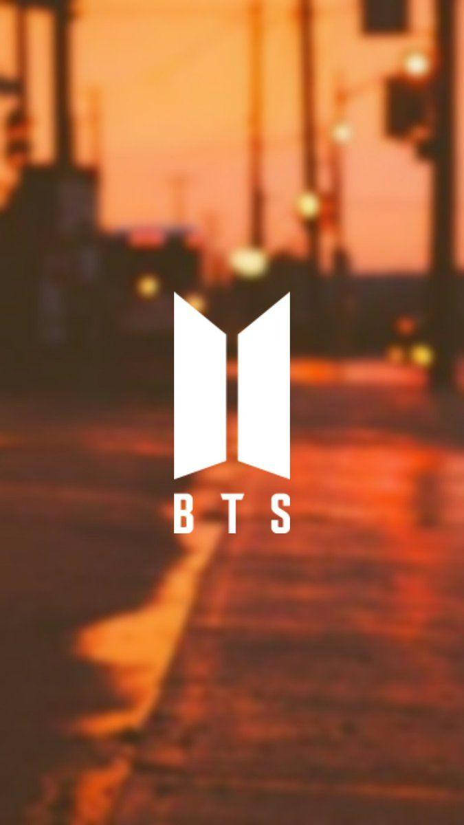 Прегърнете нюансите на пастелно оранжевата естетика на BTS настроението Тапет