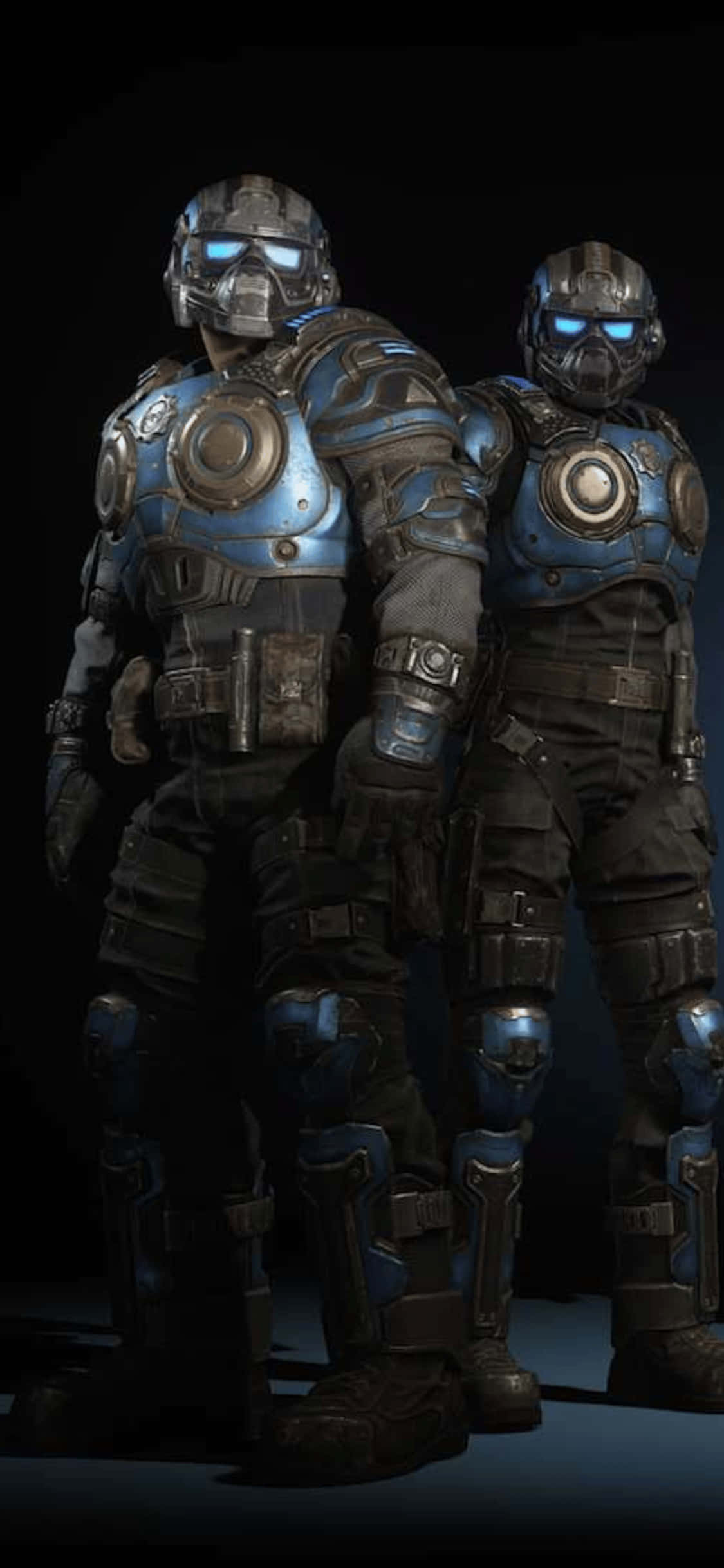 два мъжа в сини костюми от Gears of War, стоящи един до друг Тапет