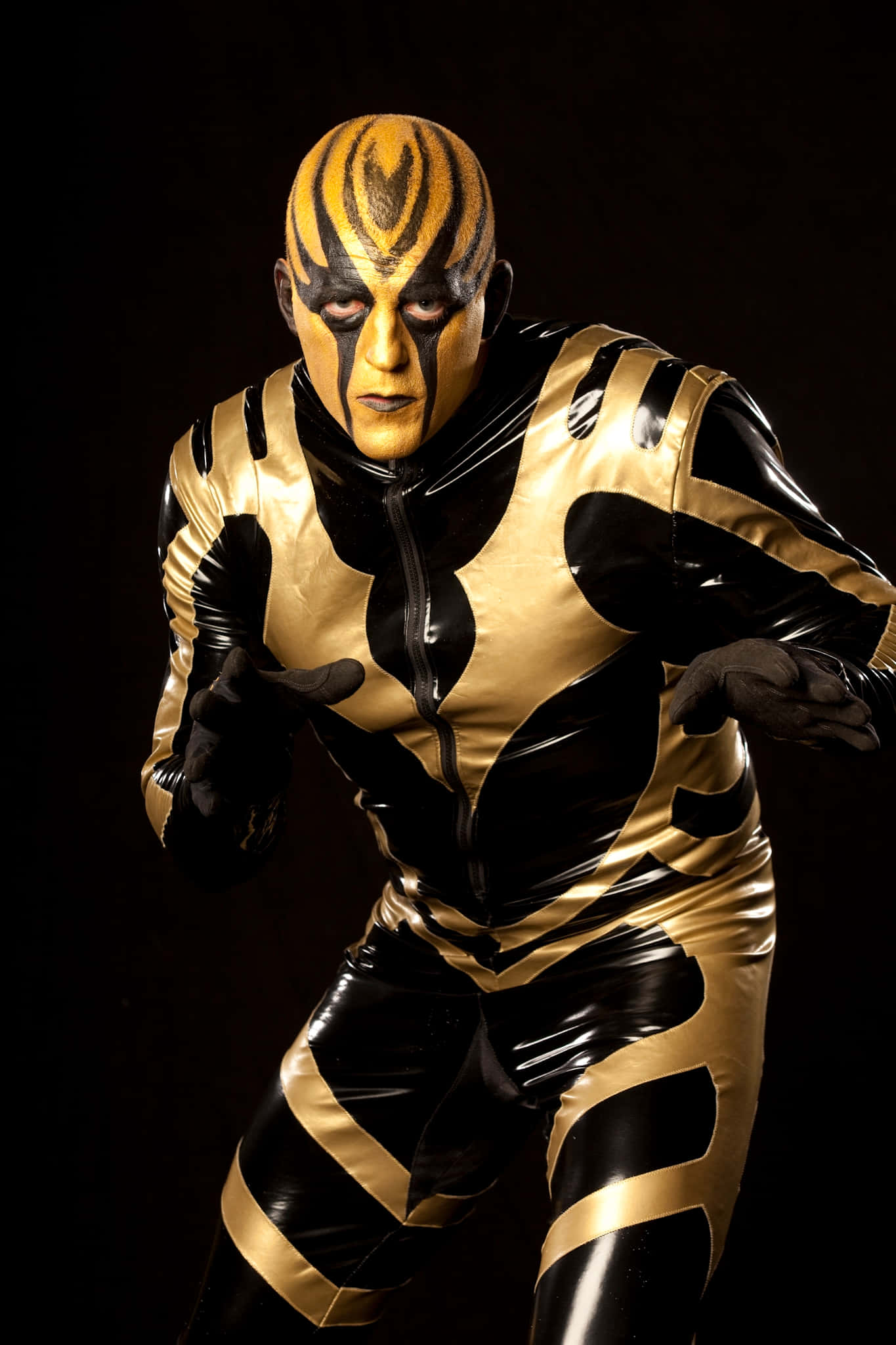 Дъстин Роудс в неговия емблематичен костюм Goldust Тапет
