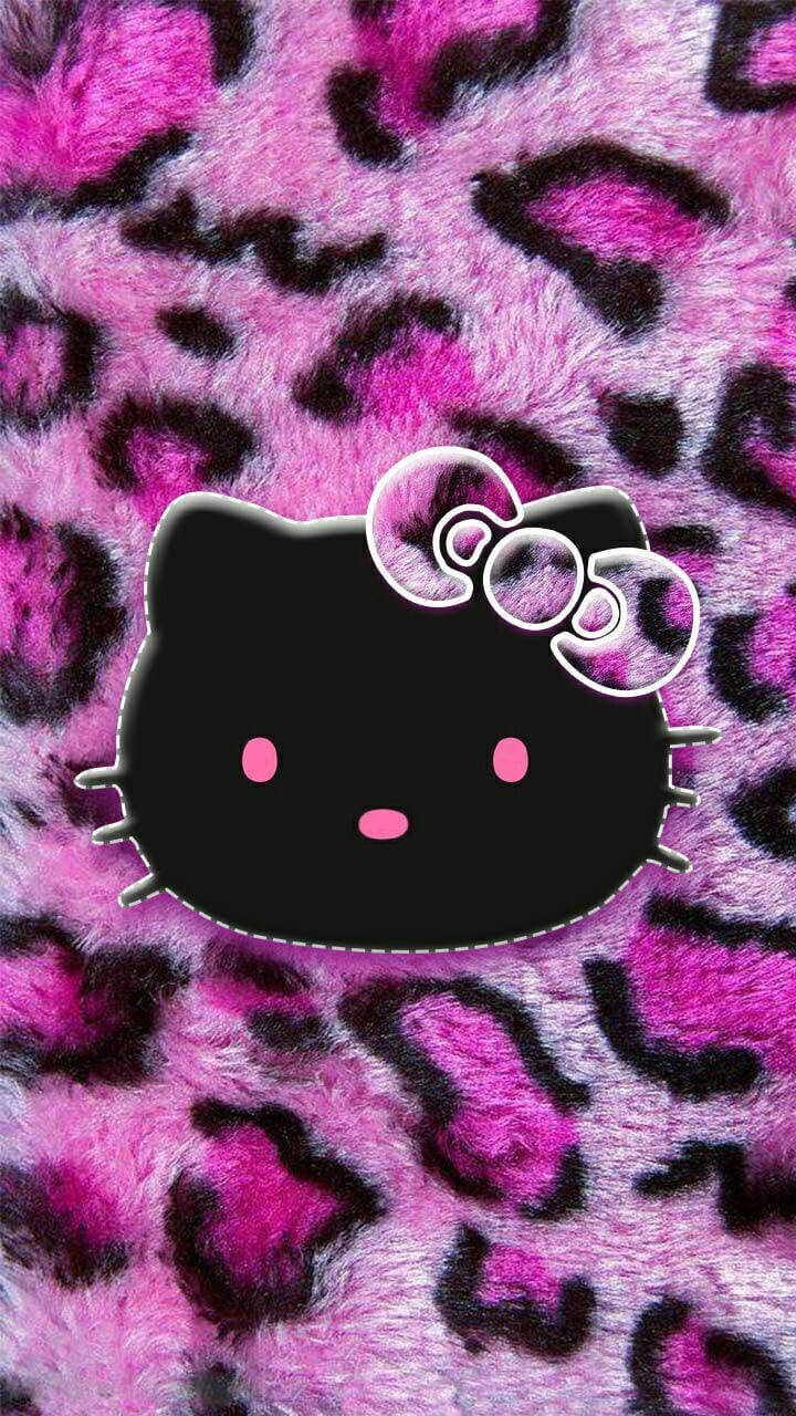 Черна Hello Kitty върху животински принт Тапет