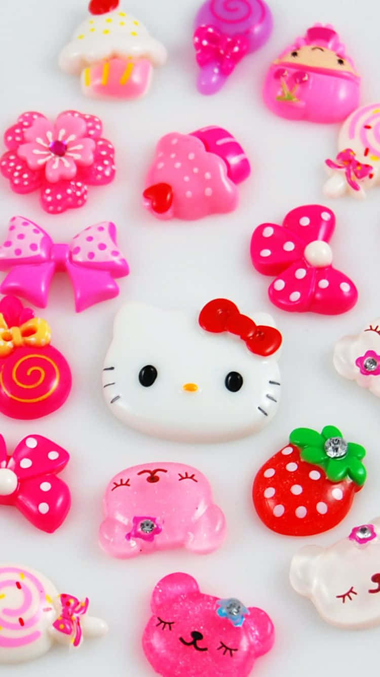 Сладък фон с розови Hello Kitty вещи Тапет