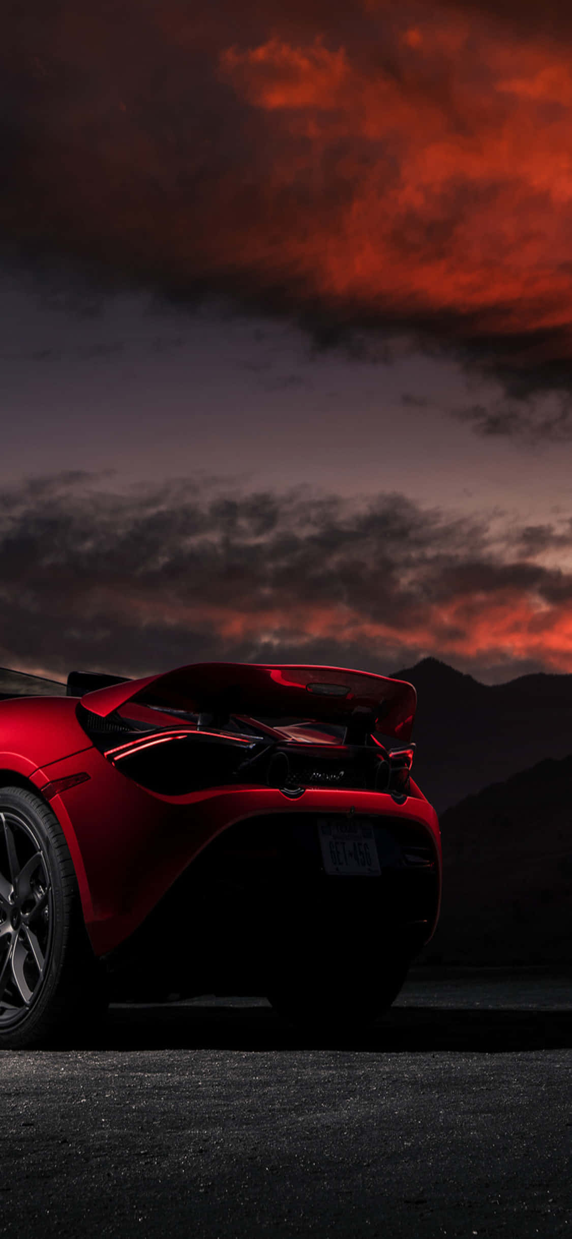 Фон за iPhone X с Mclaren 720s червен залез Тапет