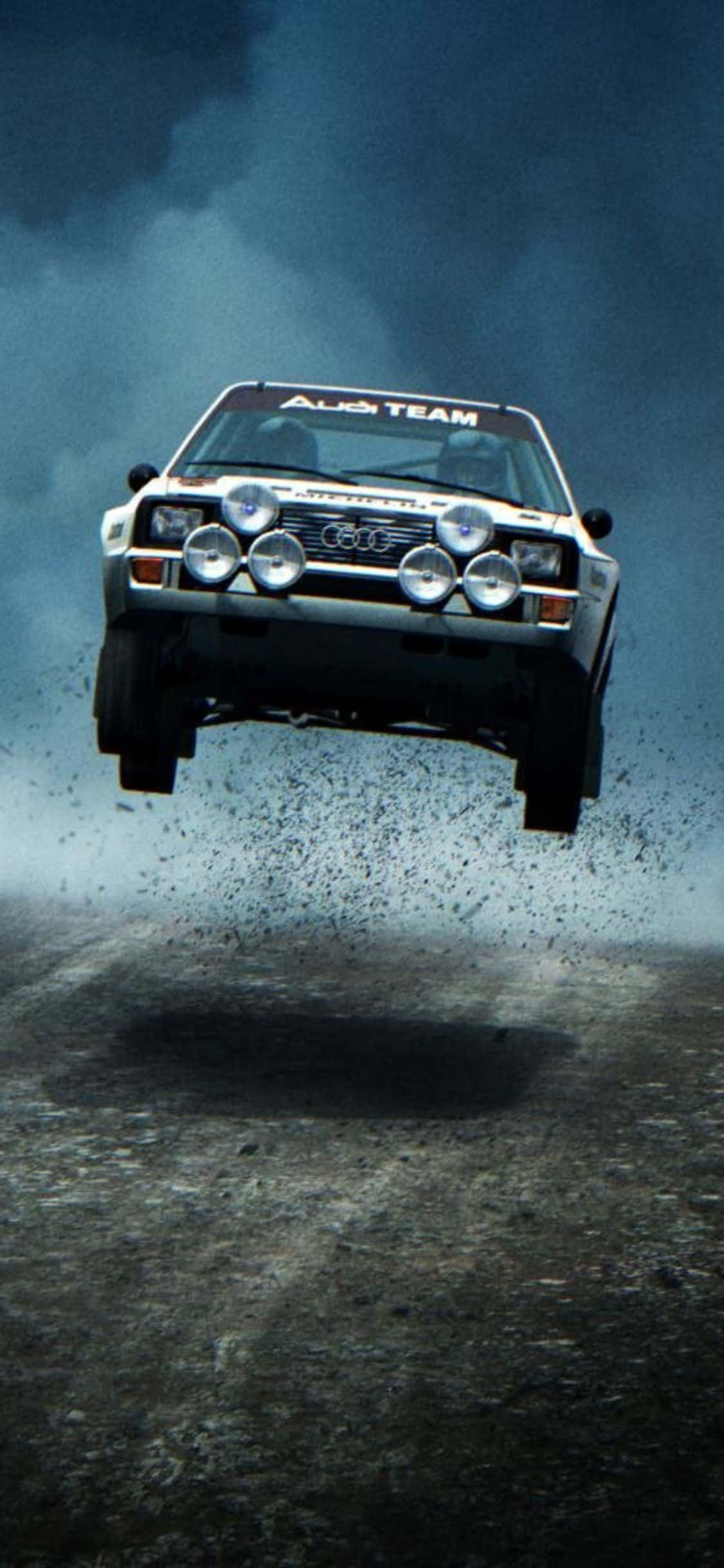 Почувствайте прилив на вълнение с iPhone Xs Dirt Rally Тапет