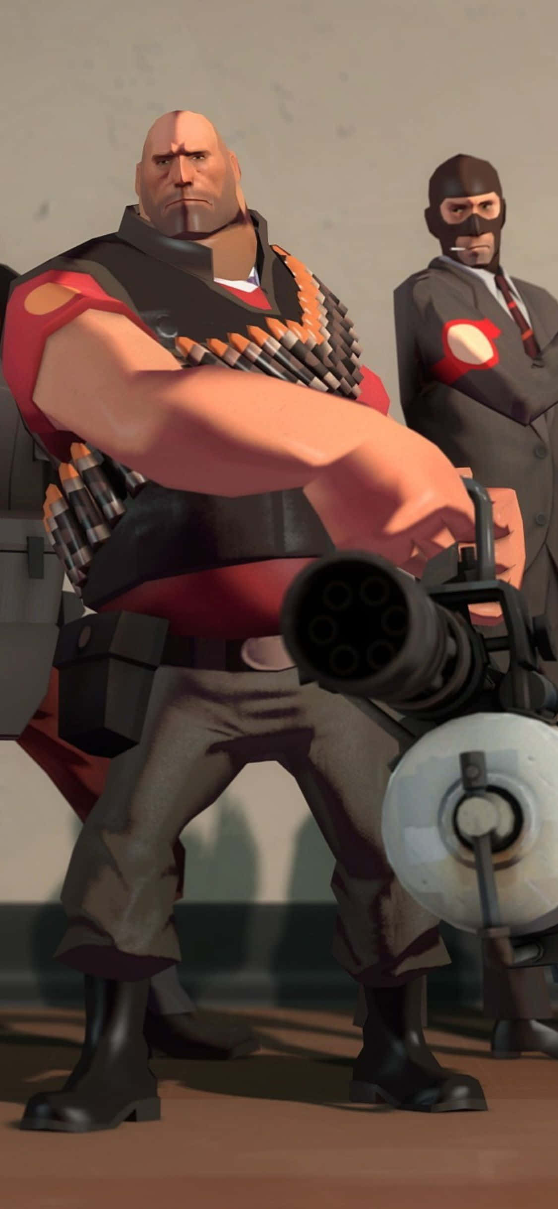 Фон за iPhone XS от Team Fortress 2 с Heavy и Spy Тапет