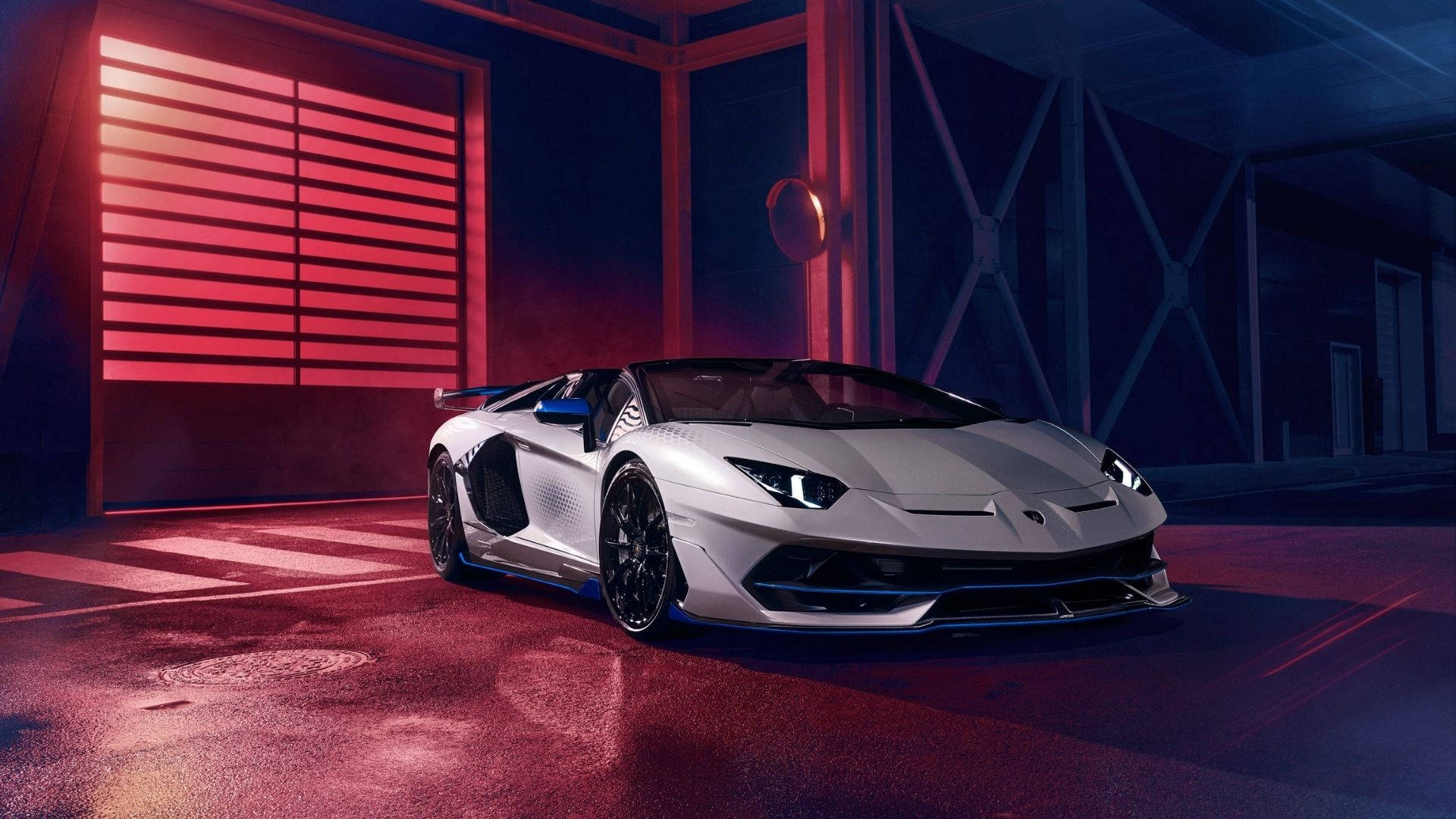 Зашеметяващ Lamborghini Aventador SVJ Xago в полунощно синьо Тапет
