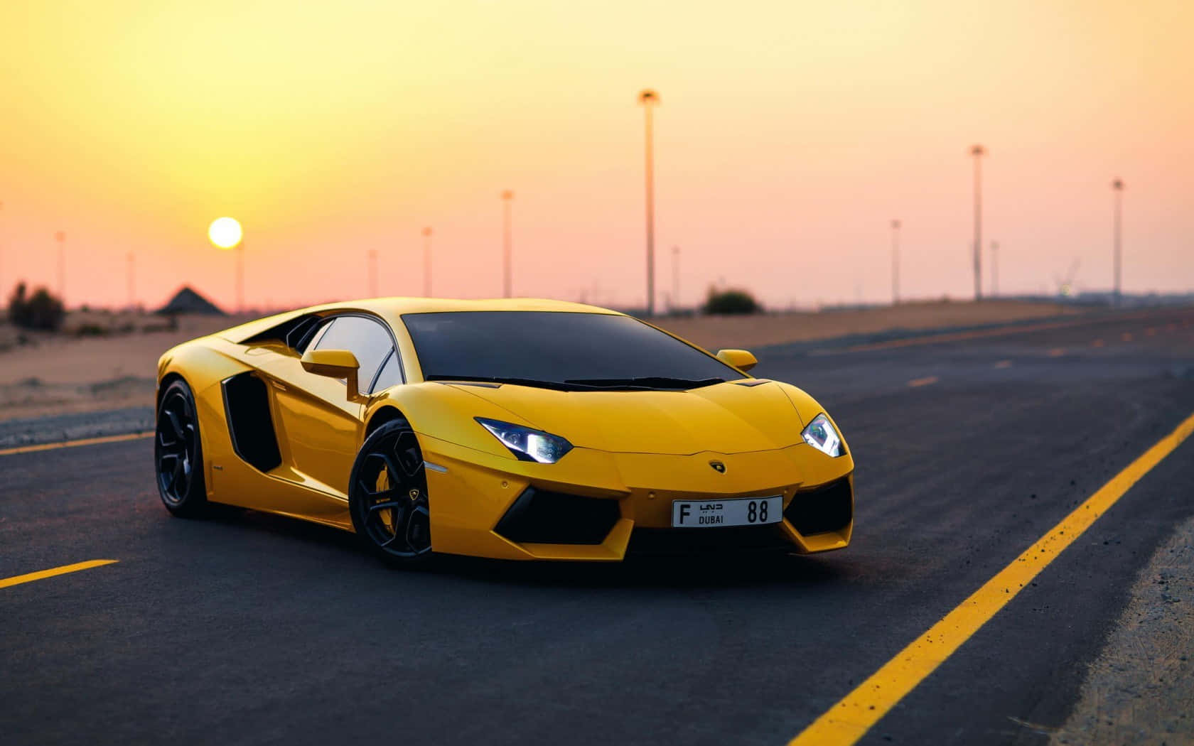 Изживейте мощта на представянето на Lamborghini Тапет