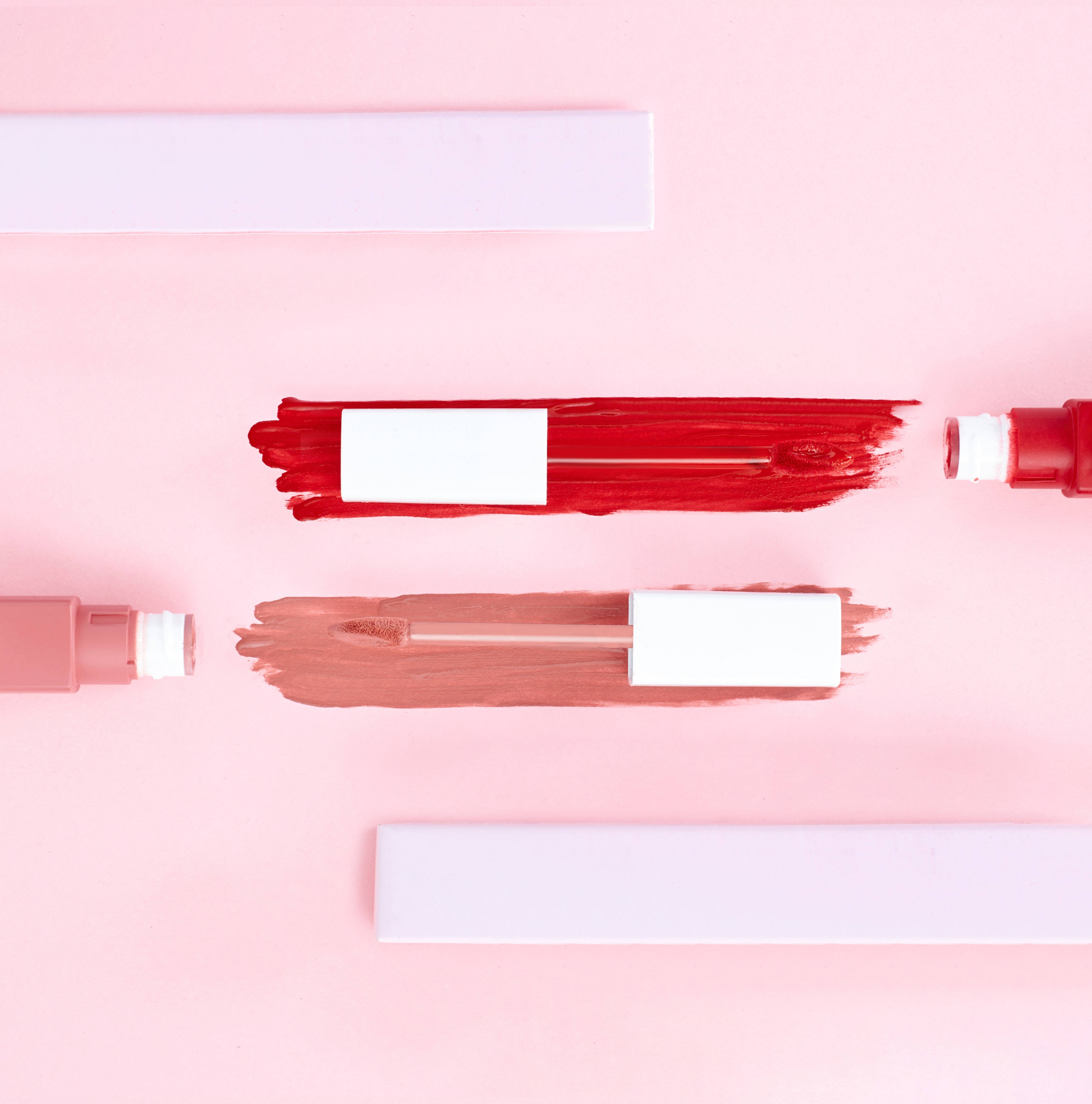 Lipsticks On Pink Background Тапет
