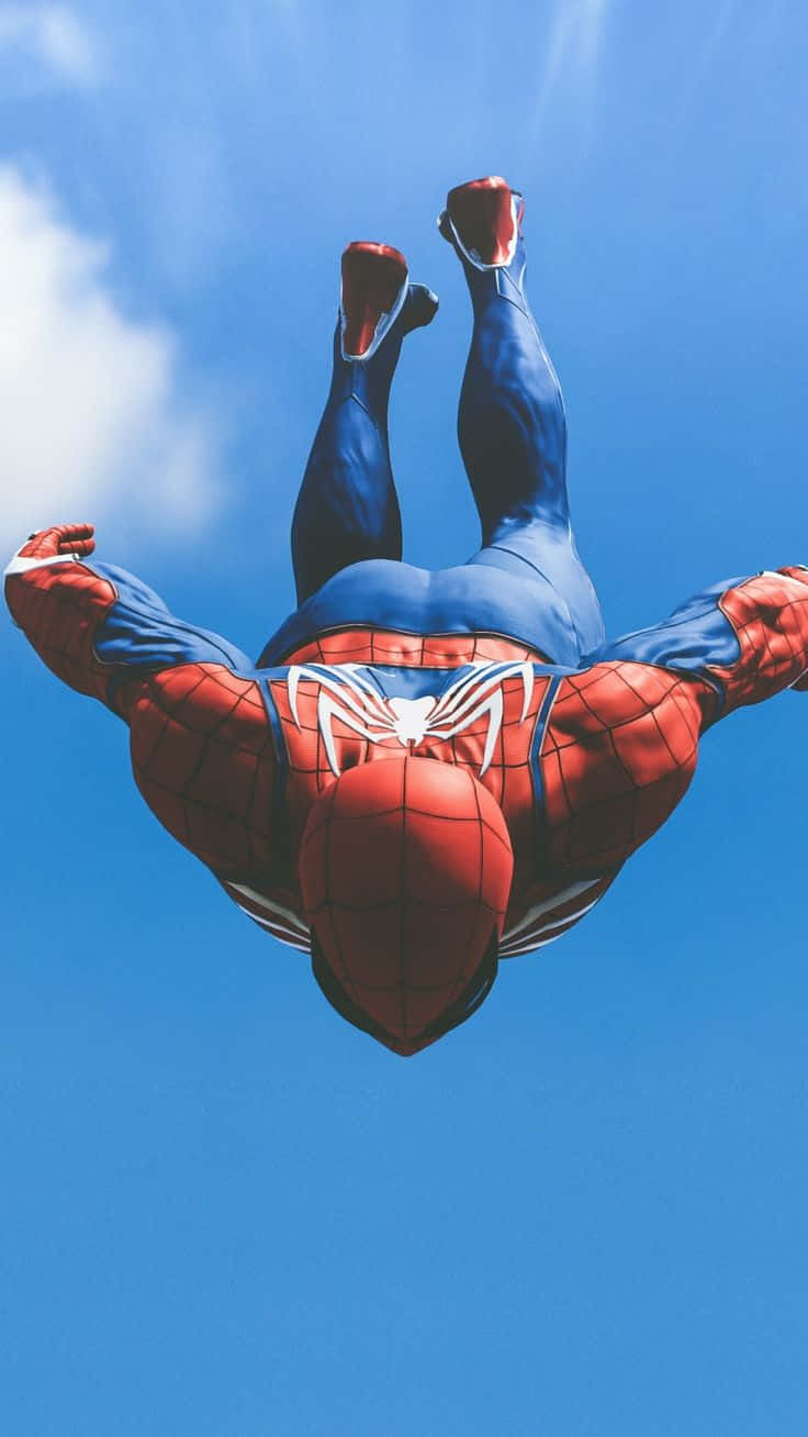 Спайдърмен от Marvel PS4 се гмурка от небето Тапет