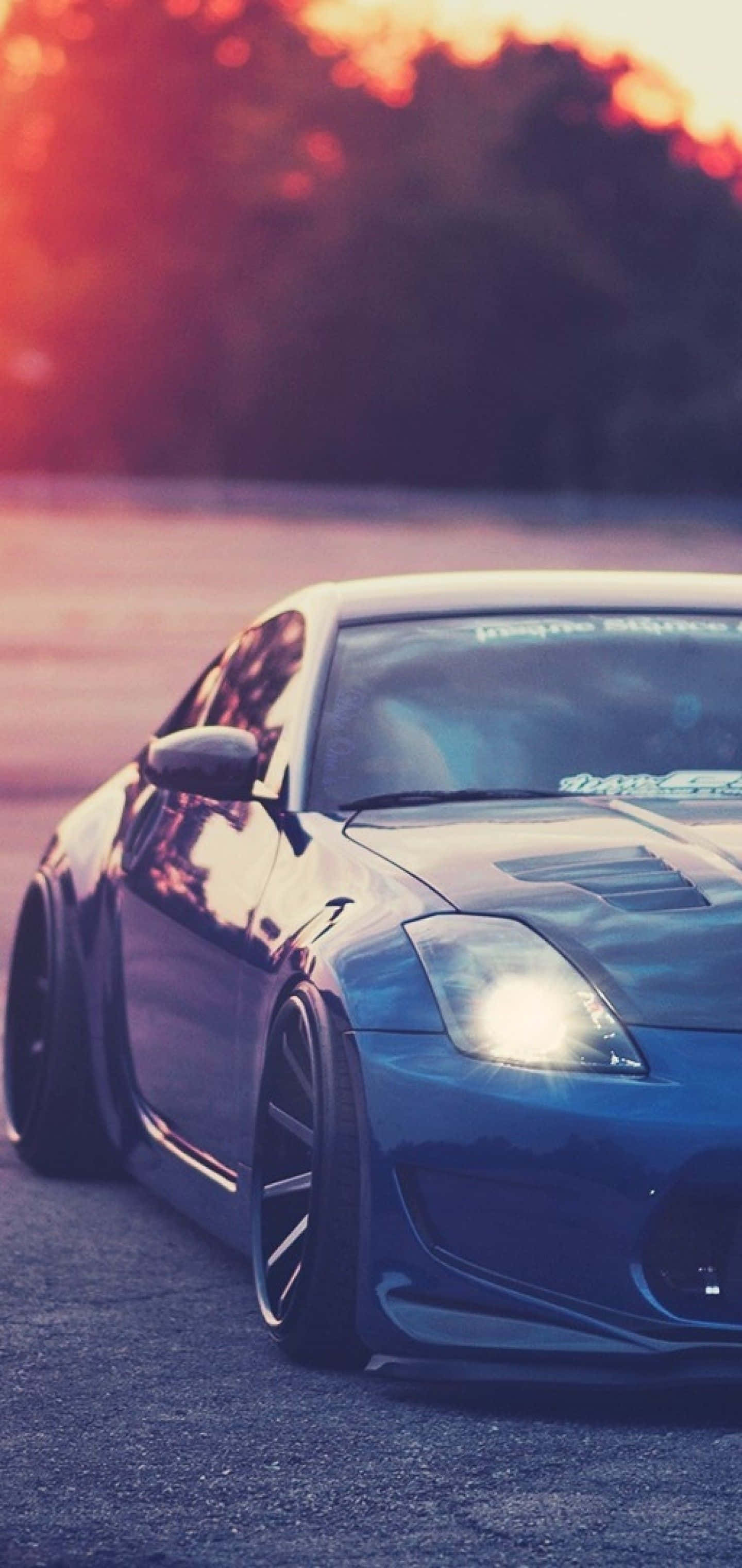Метален син Nissan 350Z iPhone Тапет