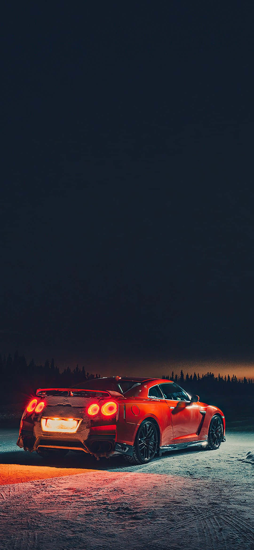 Динамичен Nissan R35 GTR, показващ мощ и стил Тапет