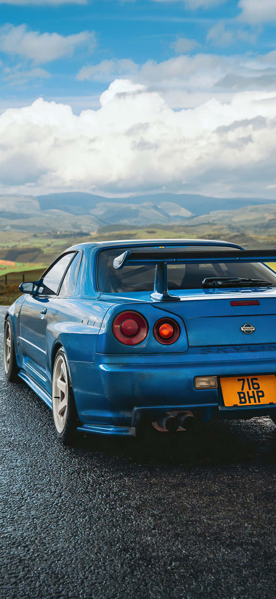 Изживейте Nissan Skyline с iPhone Тапет