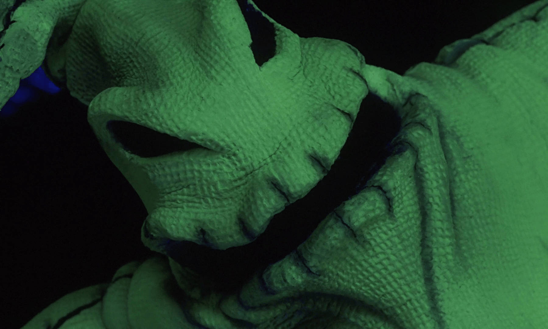Близък кадър на Oogie от „Кошмар преди Коледа“ – зелен Тапет
