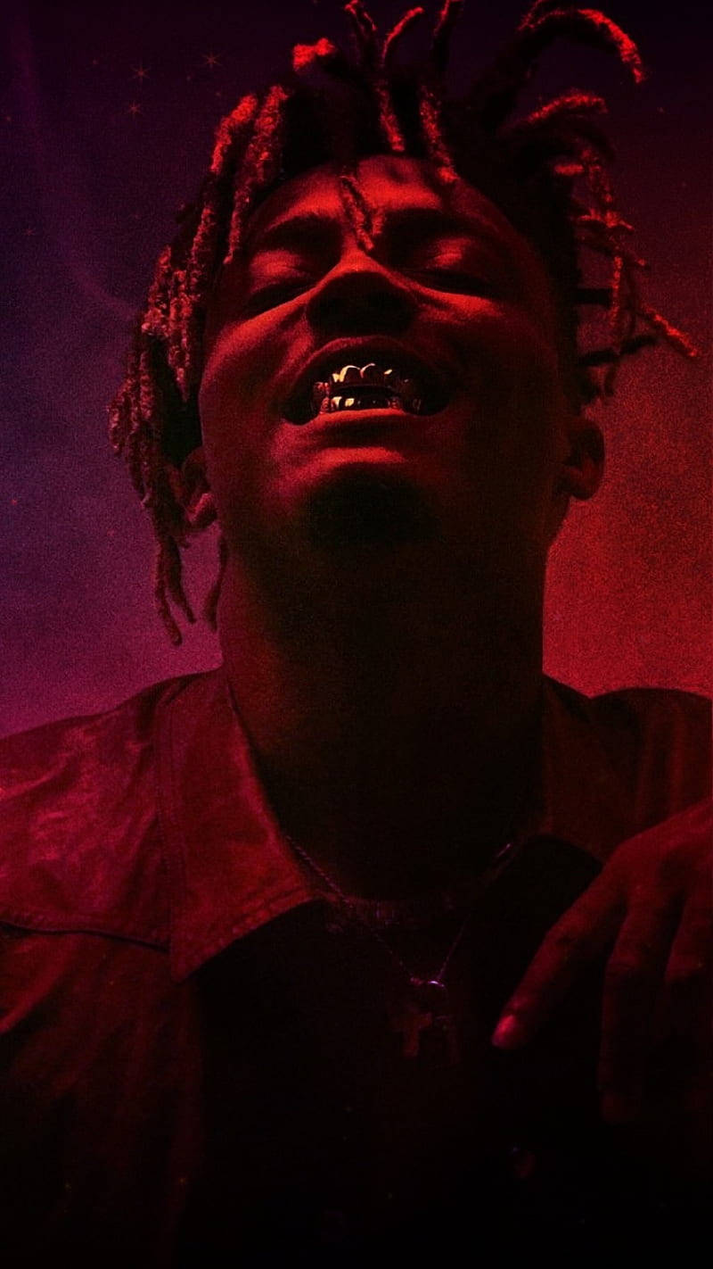 Готина снимка на Juice WRLD с показване на зъби Тапет