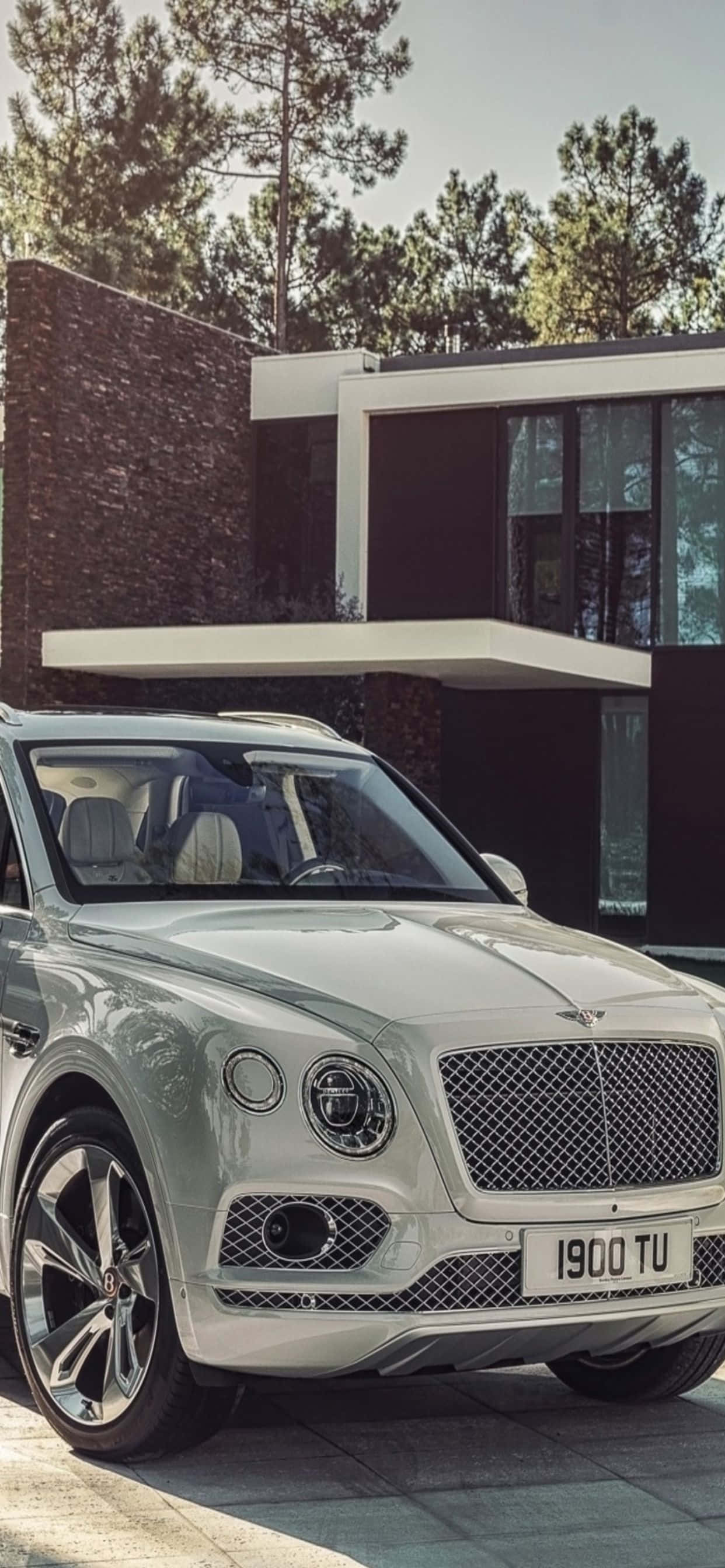 „Изживейте луксозен начин на живот с iPhone Xs Max и Bentley“ Тапет