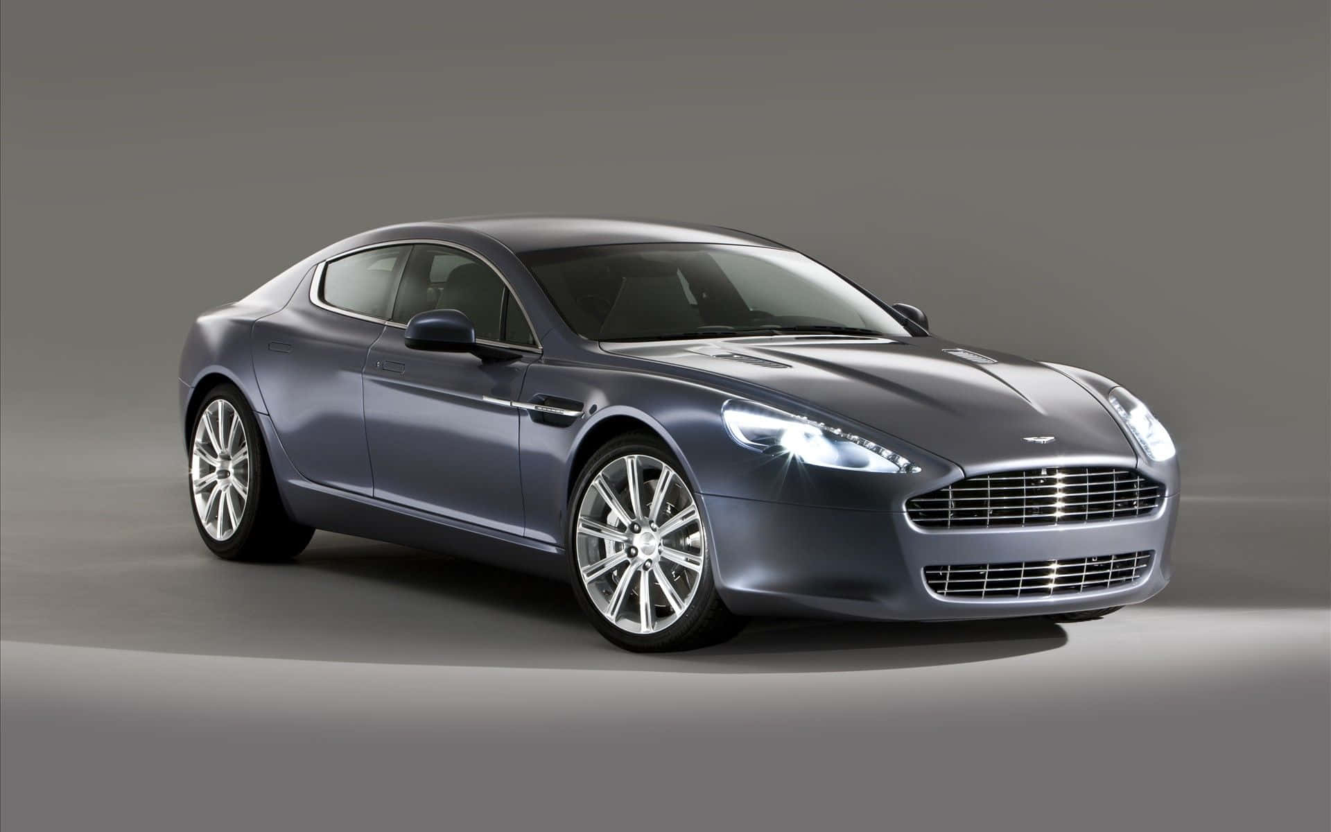 Изидащ Aston Martin Rapide S в движение Тапет