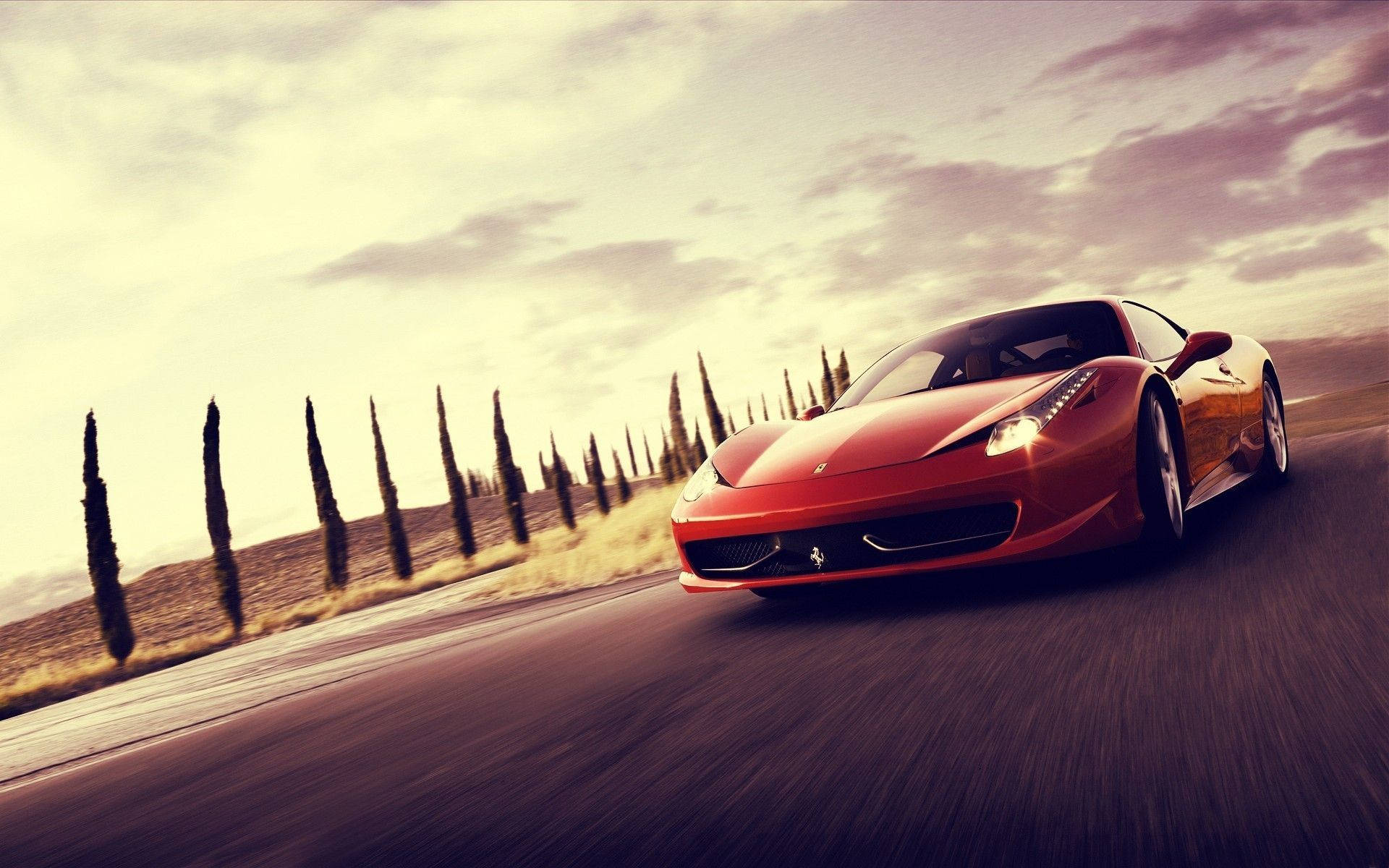 Тапет за кола на червен Ferrari 458 Italia в движение.