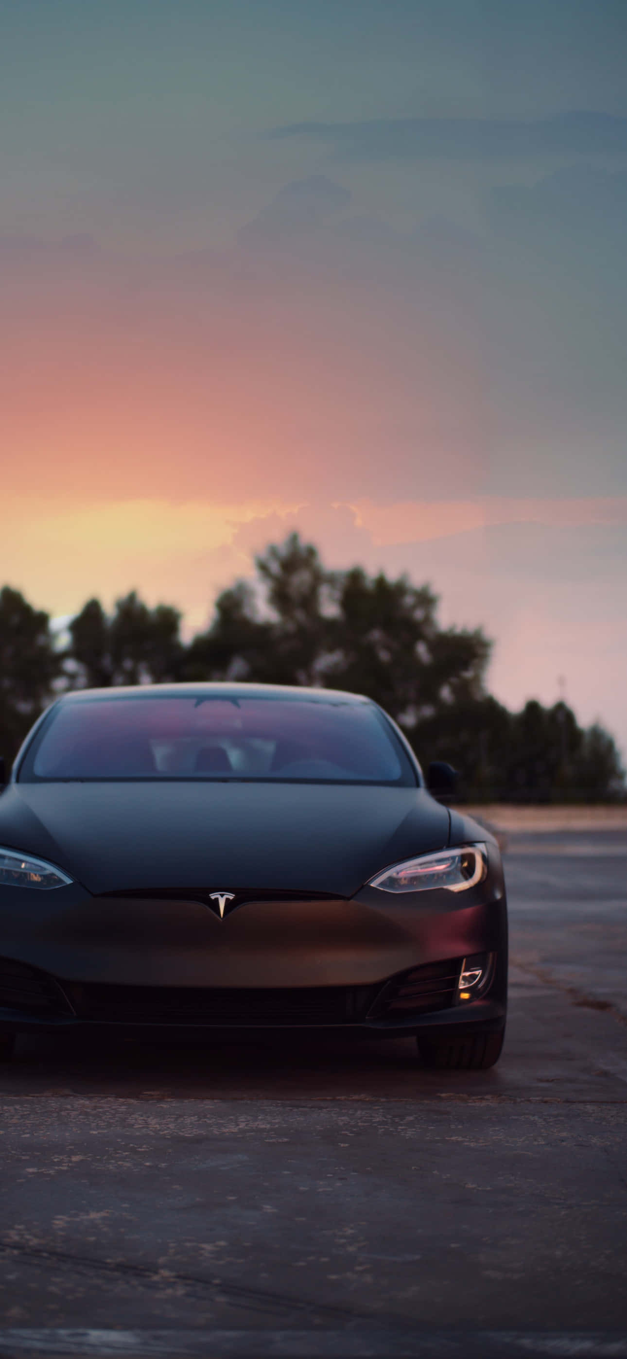 Наслаждайте се безжичен свят с Tesla iPhone Тапет
