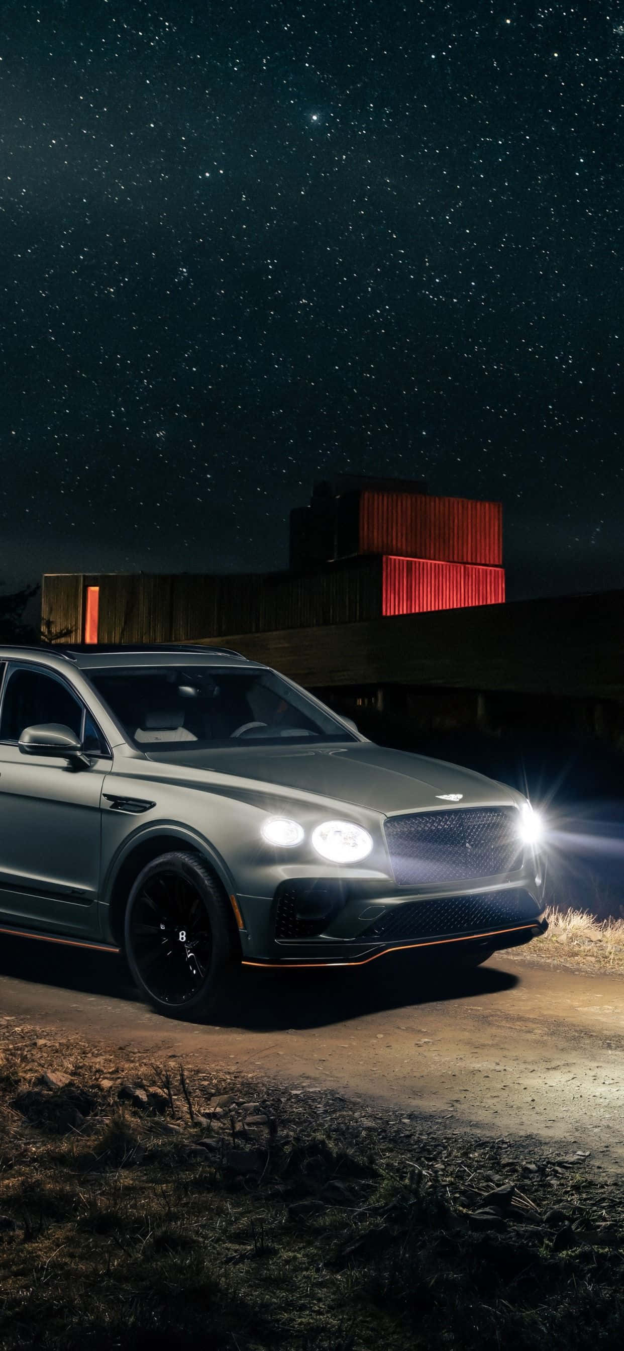 новият bentley bentayga е показан нощя Тапет