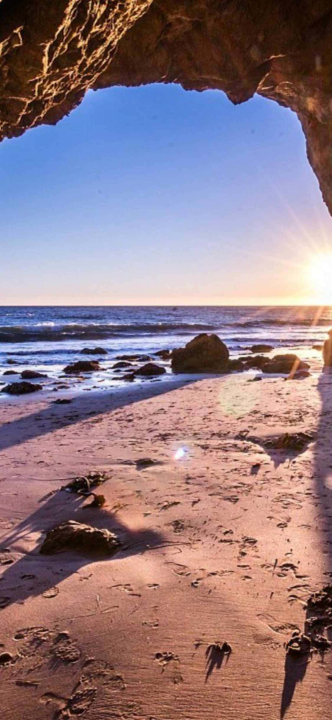 Прибрежни вибрации в iPhone Xs Malibu Тапет