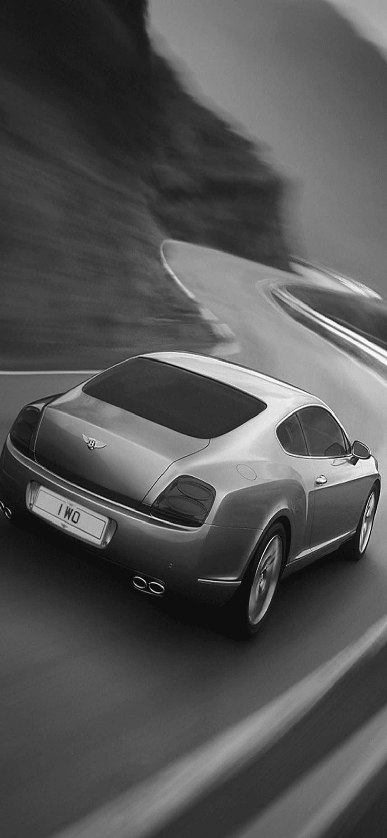 Седни зад волана и изпитай превъзходен лукс с iPhone Xs Max Bentley Тапет