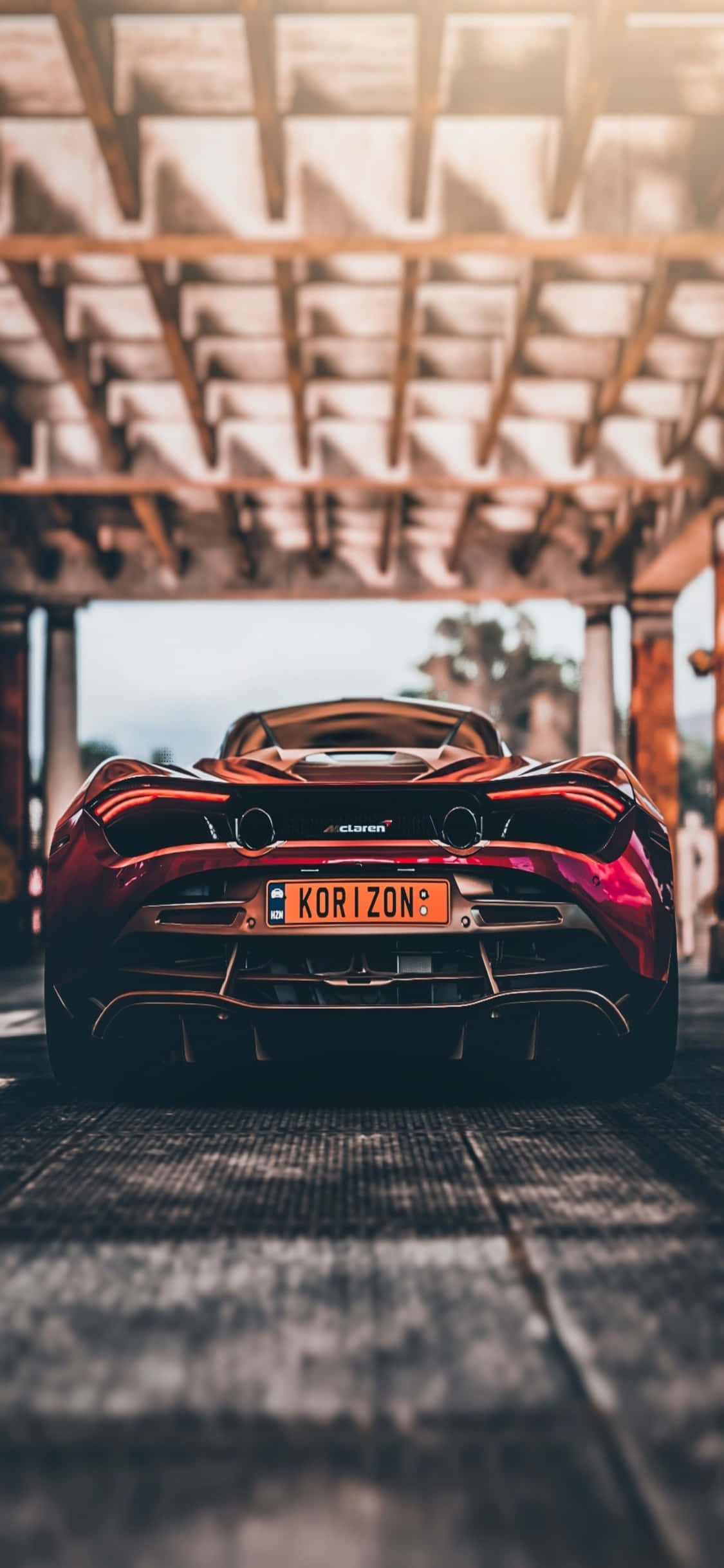Седни зад волана на iPhone Xs McLaren 720s Тапет