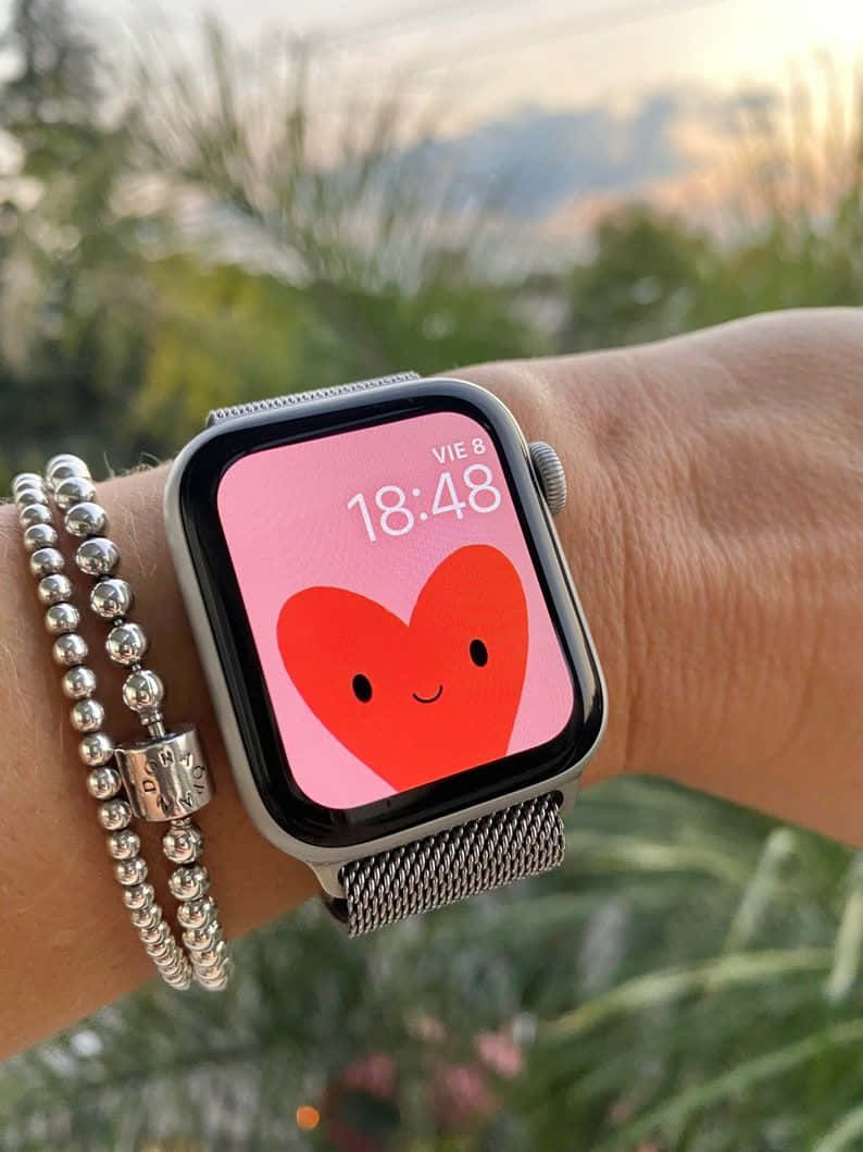 Сладко лице за Apple Watch със сърце Тапет