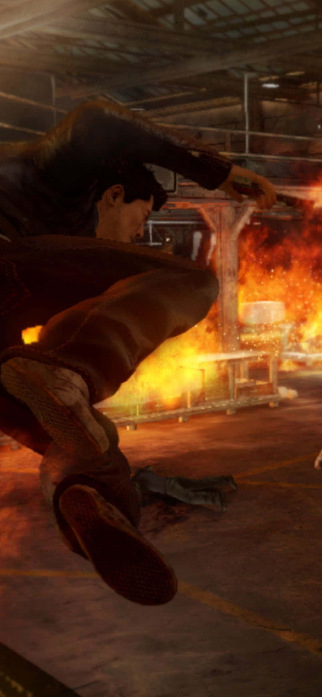 Фон от Sleeping Dogs Payback за iPhone Xs: Wei прескача парапет в горящ склад Тапет