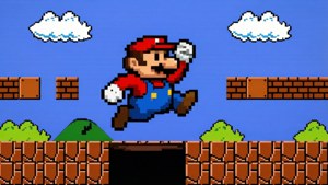 Пикселно изкуство на Марио, прескачащ яма в класическо 8-битово ниво от Super Mario, ретро и носталгично. — Марио Тапет