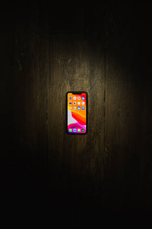 тапет iPhone xs max върху дървен под
