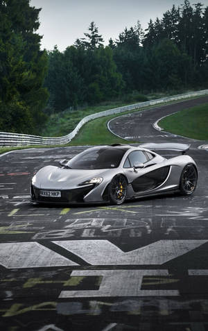 Бял спортивен автомобил McLaren на курс за дрифт iPhone — Lenovo Idea Tab Plus Тапет