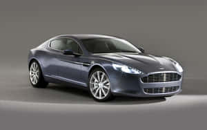 Изидащ Aston Martin Rapide S в движение — Steam Deck OLED Тапет