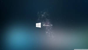 Тапет на Windows 10 с бял лого с дим на синя галактика