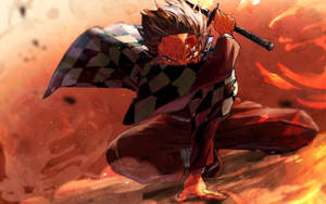 Тапет на Demon Slayer с Камадо Танджиро, обграден от дим и огън.